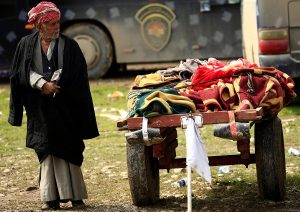 A cart loaded with bodies of civilians killed in air strike, is seen during a battle between Iraqi forces and Islamic State militants, in Mosul, Iraq March 17, 2017. REUTERS/Thaier Al-Sudani