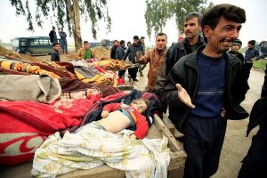 ATTENTION EDITORS - VISUAL COVERAGE OF SCENES OF INJURY OR DEATH Relatives react near the bodies of civilians killed in air strike, during a battle between Iraqi forces and Islamic State militants, in Mosul, Iraq March 17, 2017. REUTERS/Thaier Al-SudaniTEMPLATE OUT TPX IMAGES OF THE DAY